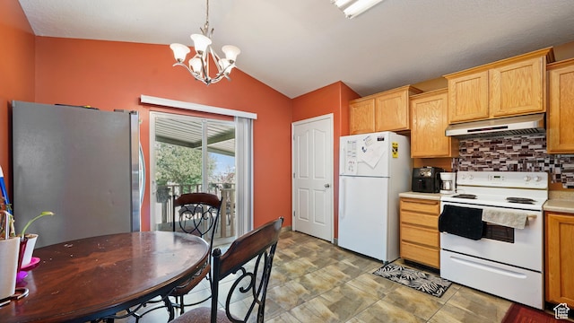 6267 S Waller Ln W, West Jordan, UT 84081 - kitchen with under cabinet range hood, white appliances, vaulted ceiling, backsplash, and a chandelier