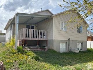 6267 S Waller Ln W, West Jordan, UT 84081 - back of house with a lawn and a wooden deck