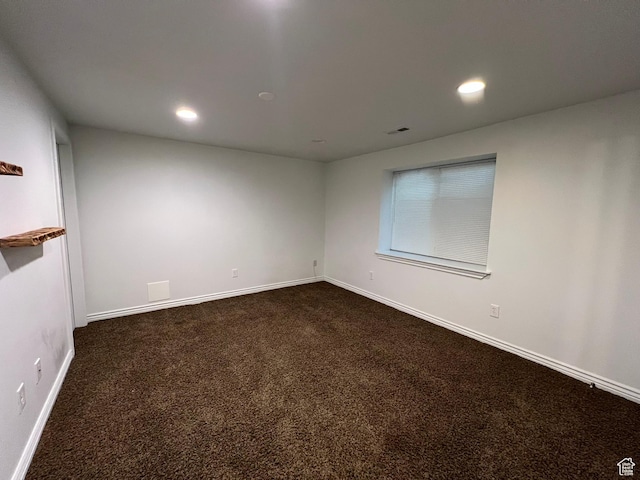 986 Davenport Dr S, Grantsville, UT 84029 - spare room with visible vents, baseboards, dark carpet, and recessed lighting