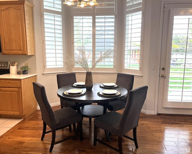 986 Davenport Dr S, Grantsville, UT 84029 - dining room featuring baseboards and hardwood / wood-style floors