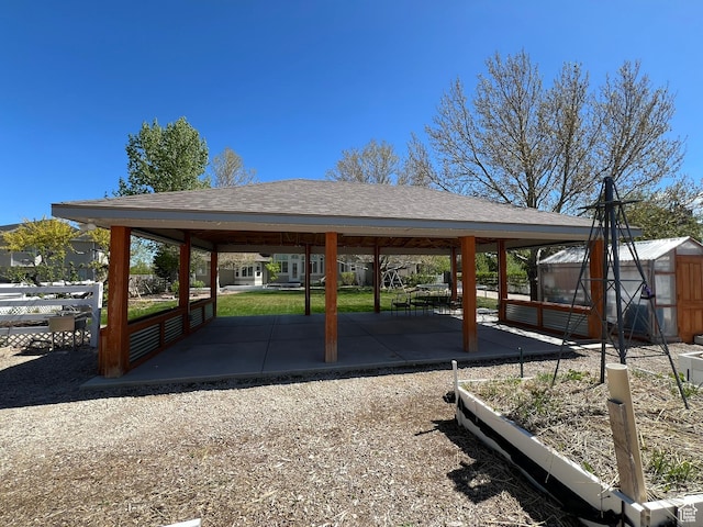 986 Davenport Dr S, Grantsville, UT 84029 - view of home's community featuring an outbuilding, a gazebo, fence, and an exterior structure