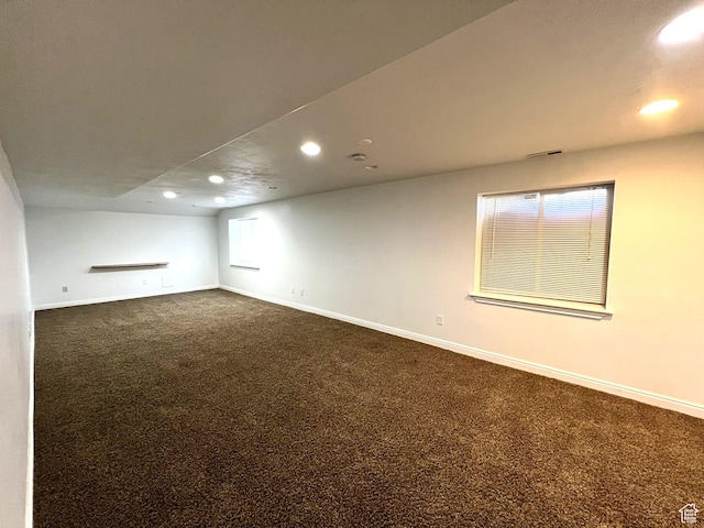986 Davenport Dr S, Grantsville, UT 84029 - below grade area with baseboards, dark carpet, and recessed lighting