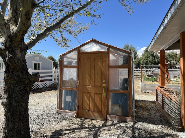 986 Davenport Dr S, Grantsville, UT 84029 - view of greenhouse featuring fence