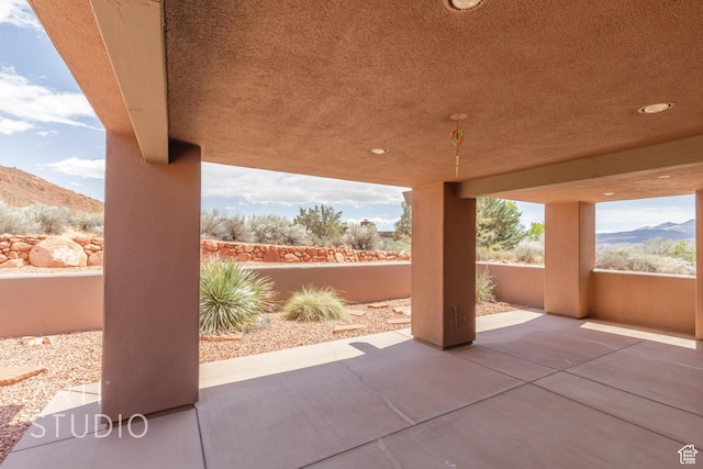 423 W Taman Ct, Ivins, UT 84738 - view of patio / terrace featuring fence and a mountain view