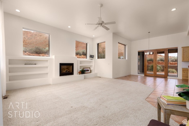 423 W Taman Ct, Ivins, UT 84738 - carpeted living area featuring a healthy amount of sunlight, a glass covered fireplace, and recessed lighting