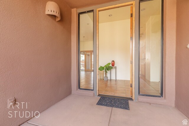 423 W Taman Ct, Ivins, UT 84738 - doorway to property with stucco siding