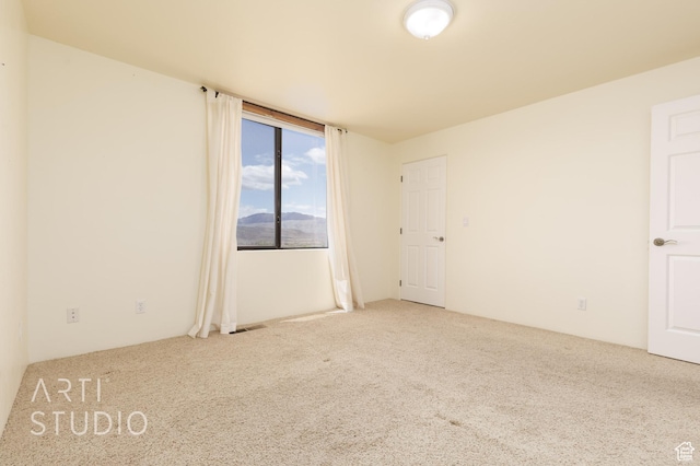 423 W Taman Ct, Ivins, UT 84738 - unfurnished room featuring visible vents and carpet