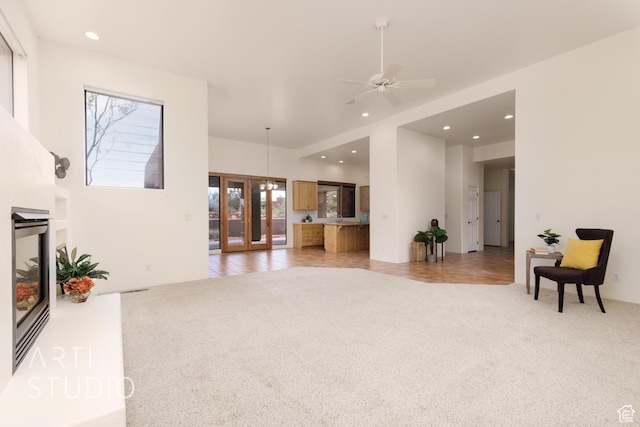 423 W Taman Ct, Ivins, UT 84738 - living area with ceiling fan, light carpet, and recessed lighting