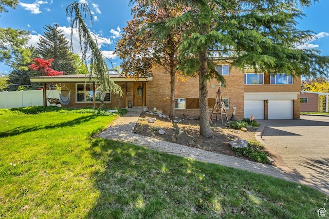 1253 Oakridge Ln, Bountiful, UT 84010 - view of front of home with a garage, decorative driveway, and brick siding