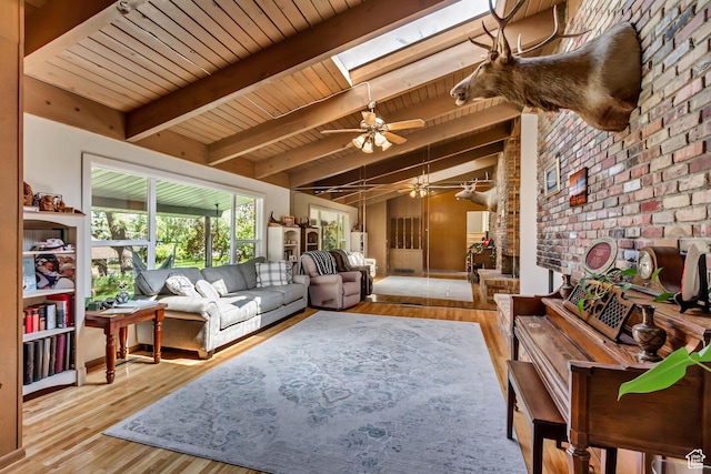 1253 Oakridge Ln, Bountiful, UT 84010 - living room with a skylight, brick wall, ceiling fan, wood finished floors, and wood ceiling