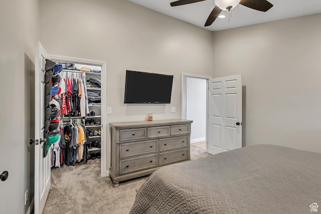1253 Oakridge Ln, Bountiful, UT 84010 - bedroom with a walk in closet, light carpet, a closet, a high ceiling, and ceiling fan