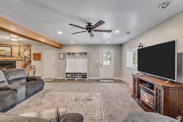 1253 Oakridge Ln, Bountiful, UT 84010 - carpeted living area featuring a glass covered fireplace, recessed lighting, ceiling fan, baseboards, and a textured ceiling