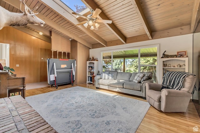 1253 Oakridge Ln, Bountiful, UT 84010 - living area with ceiling fan, a skylight, light wood finished floors, wooden ceiling, and wood walls