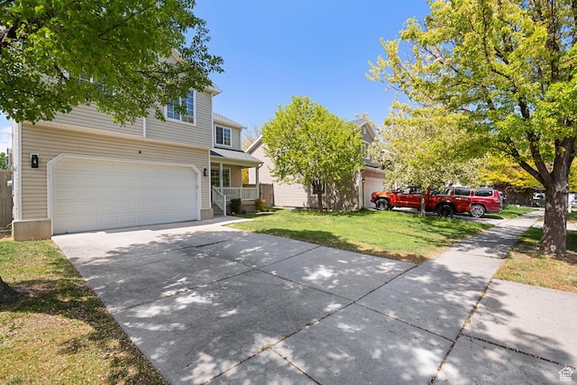 7883 N Geronimo Dr E, Eagle Mountain, UT 84005 - view of front facade with a garage, a front lawn, driveway, and covered porch