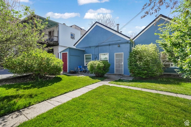 827 E 100 S, Salt Lake City, UT 84102 - view of front facade featuring stucco siding and a front lawn