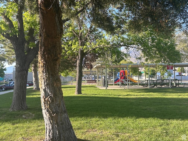 325 W 650 N Unit 11, Orem, UT 84057 - view of community featuring a lawn and playground community