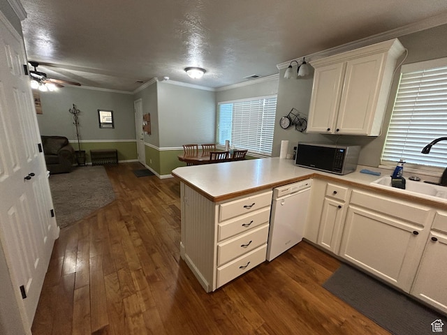 325 W 650 N Unit 11, Orem, UT 84057 - kitchen featuring a sink, dark wood-style flooring, a peninsula, and dishwasher