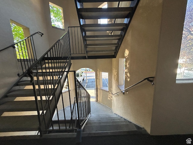 325 W 650 N Unit 11, Orem, UT 84057 - staircase featuring a wealth of natural light and a towering ceiling
