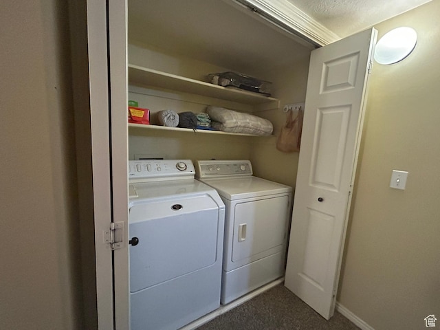 325 W 650 N Unit 11, Orem, UT 84057 - laundry room featuring baseboards, laundry area, dark carpet, and independent washer and dryer
