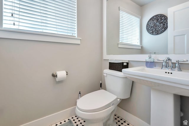 494 N 300 E, American Fork, UT 84003 - bathroom featuring baseboards, a sink, and toilet