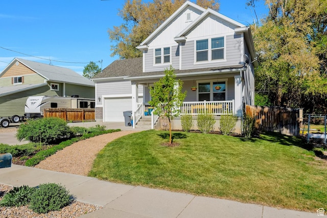 494 N 300 E, American Fork, UT 84003 - view of front of property featuring a porch, fence, board and batten siding, and a front yard