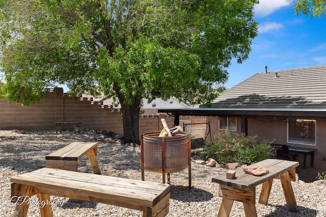 186 N 870 W, Hurricane, UT 84737 - exterior space featuring a patio, a fire pit, and fence