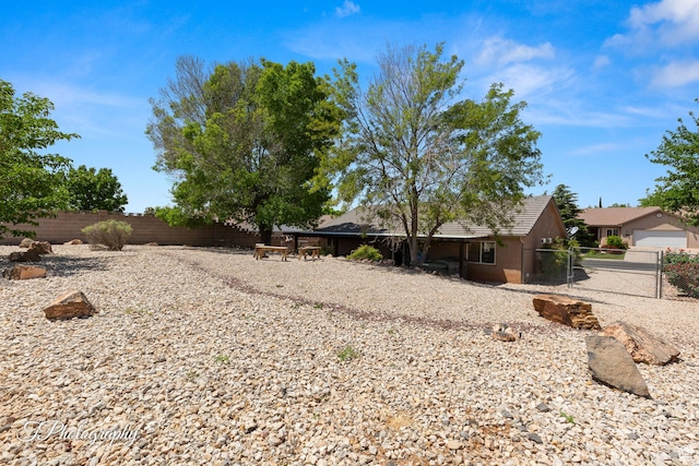 186 N 870 W, Hurricane, UT 84737 - view of yard featuring fence private yard and a gate