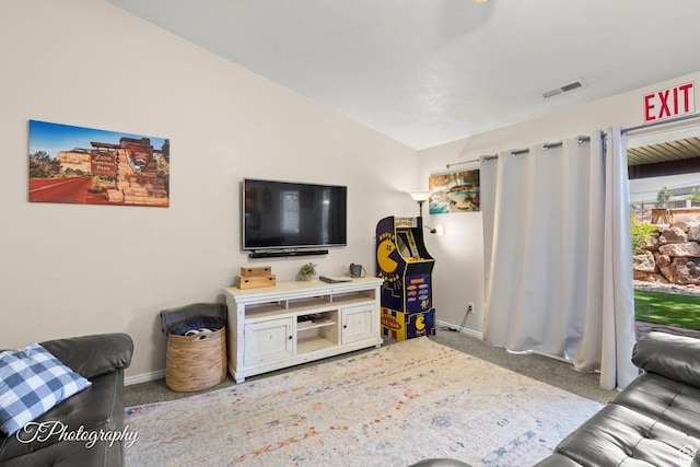 186 N 870 W, Hurricane, UT 84737 - carpeted living room with visible vents, baseboards, and vaulted ceiling