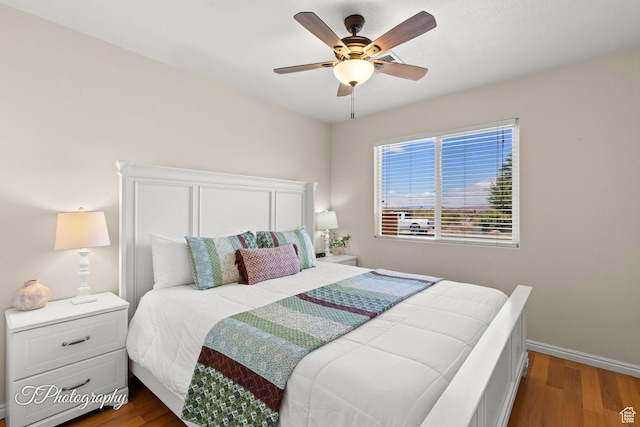 186 N 870 W, Hurricane, UT 84737 - bedroom featuring baseboards, a ceiling fan, and dark wood finished floors