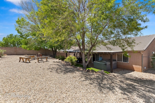 186 N 870 W, Hurricane, UT 84737 - view of yard featuring a fenced backyard and a hot tub