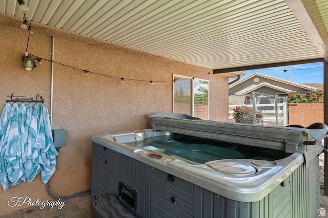 186 N 870 W, Hurricane, UT 84737 - view of patio with a hot tub and fence