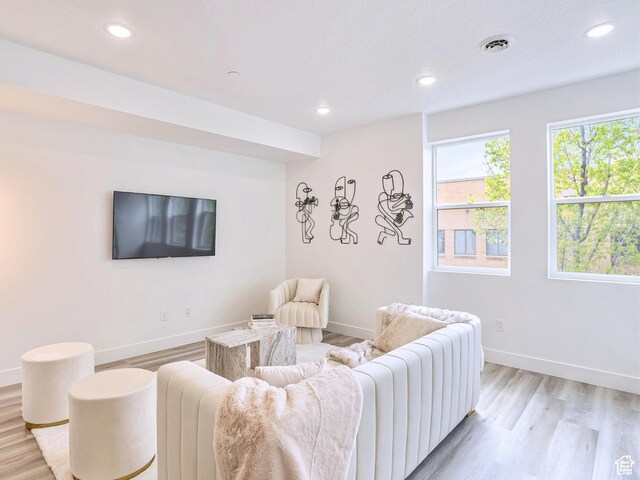 365 W 800 N Unit 3, Salt Lake City, UT 84103 - living room featuring recessed lighting, baseboards, light wood finished floors, and visible vents