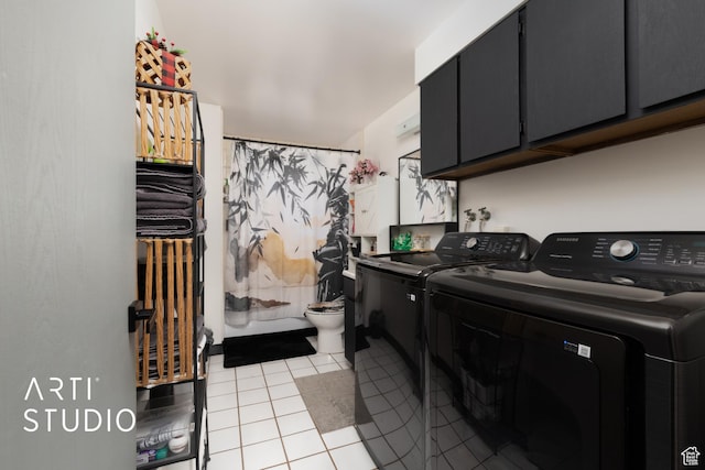 257 W 600 N, Lehi, UT 84043 - laundry room featuring light tile patterned flooring, cabinet space, and washer and clothes dryer