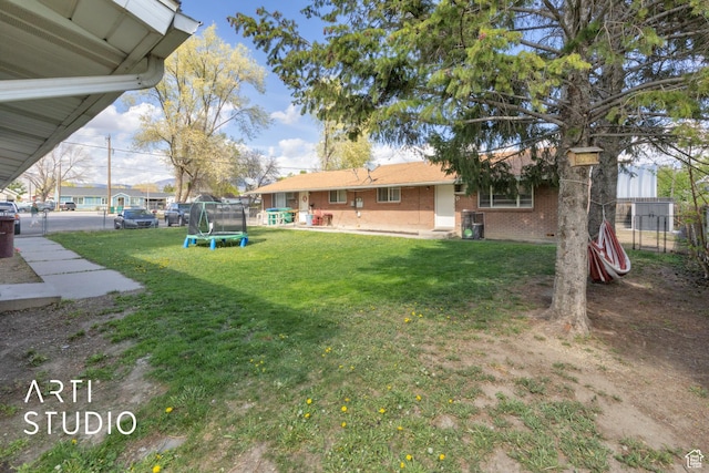 257 W 600 N, Lehi, UT 84043 - view of yard with a trampoline and a patio area