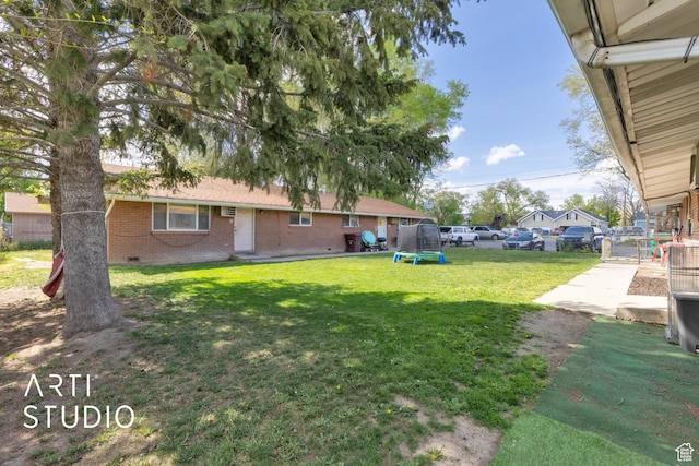 257 W 600 N, Lehi, UT 84043 - view of yard featuring a trampoline