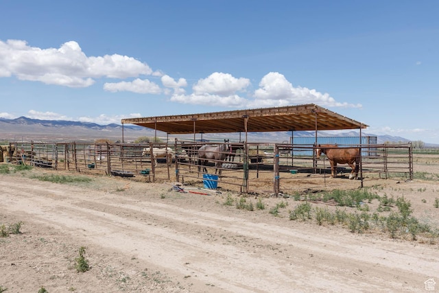 10360 S 10750 W, Axtell, UT 84621 - view of outdoor structure featuring an outbuilding, an exterior structure, a rural view, and a mountain view