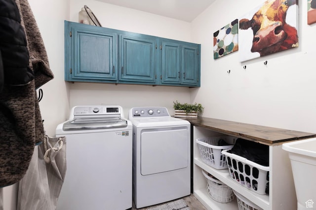 10360 S 10750 W, Axtell, UT 84621 - laundry area featuring cabinet space, wood finished floors, and washing machine and clothes dryer