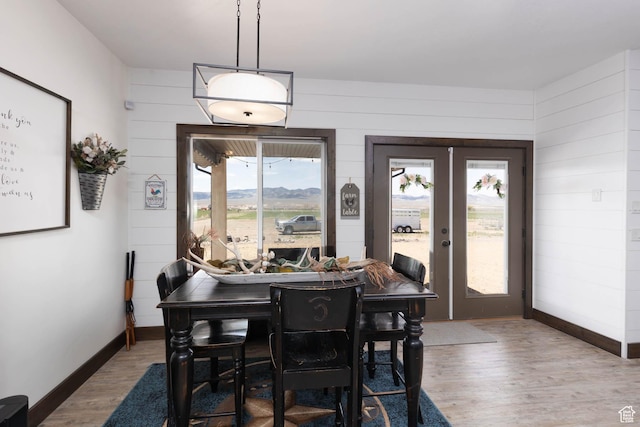 10360 S 10750 W, Axtell, UT 84621 - dining area with wooden walls, baseboards, french doors, and wood finished floors