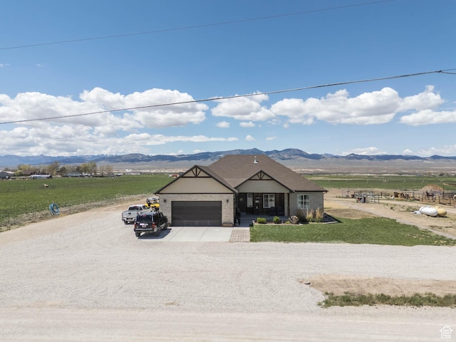 10360 S 10750 W, Axtell, UT 84621 - view of front of house with a garage, a mountain view, driveway, and a rural view