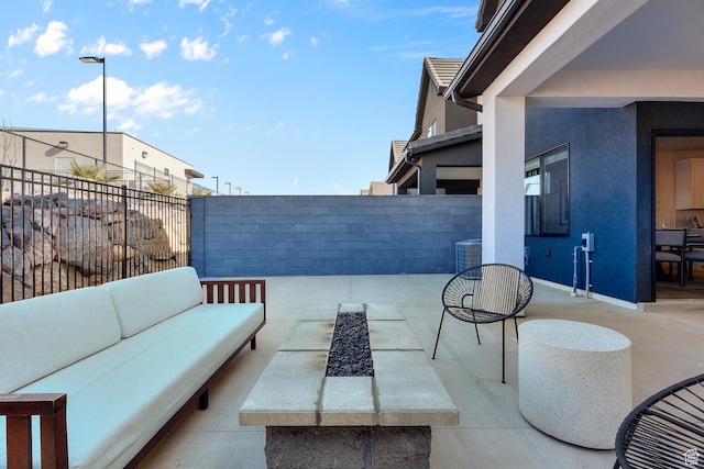 view of patio with a fenced backyard, an outdoor hangout area, and cooling unit