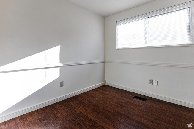5952 S 2550 W, Roy, UT 84067 - unfurnished room with baseboards, wood finished floors, and visible vents
