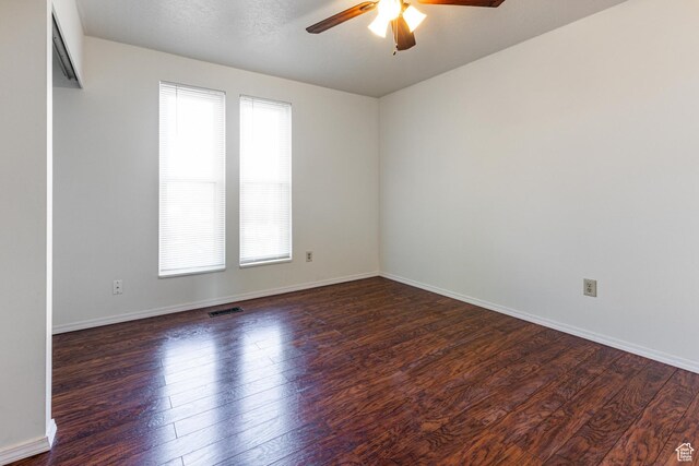 5952 S 2550 W, Roy, UT 84067 - spare room featuring baseboards, ceiling fan, visible vents, and wood finished floors