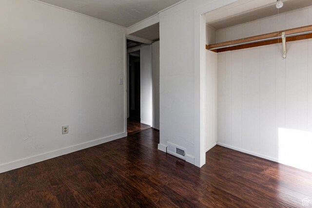 5952 S 2550 W, Roy, UT 84067 - unfurnished bedroom featuring baseboards, wood finished floors, and visible vents