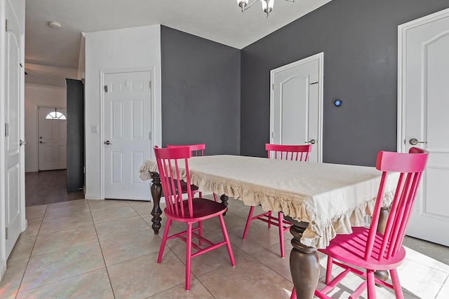 dining space with light tile patterned flooring