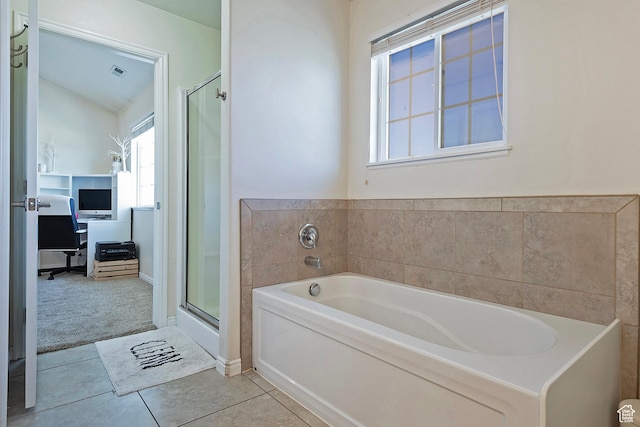full bath with a garden tub, tile patterned flooring, visible vents, lofted ceiling, and a shower stall