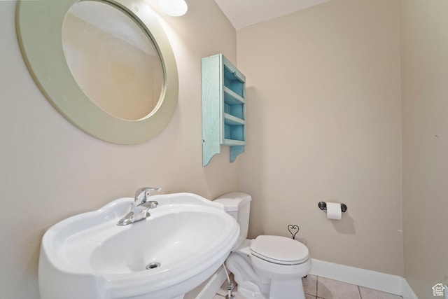 220 N 810 E, Smithfield, UT 84335 - bathroom featuring a sink, tile patterned floors, baseboards, and toilet