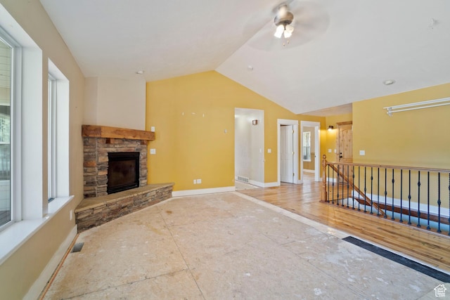 220 N 810 E, Smithfield, UT 84335 - unfurnished living room featuring ceiling fan, baseboards, lofted ceiling, and a fireplace