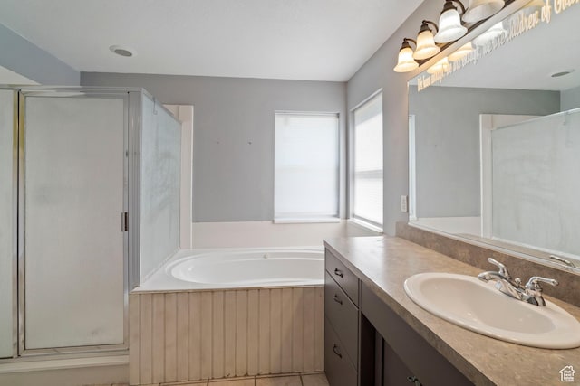 220 N 810 E, Smithfield, UT 84335 - bathroom featuring vanity, a bath, and a stall shower