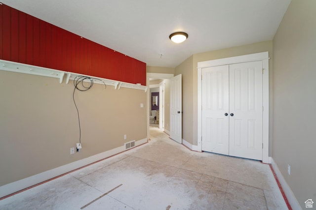 220 N 810 E, Smithfield, UT 84335 - unfurnished bedroom featuring baseboards, visible vents, and a closet