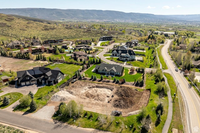 aerial view featuring a residential view and a mountain view